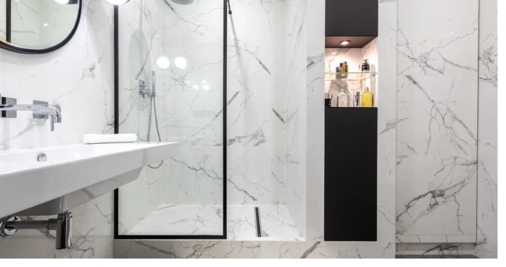 Remodeled bathroom with marble shower