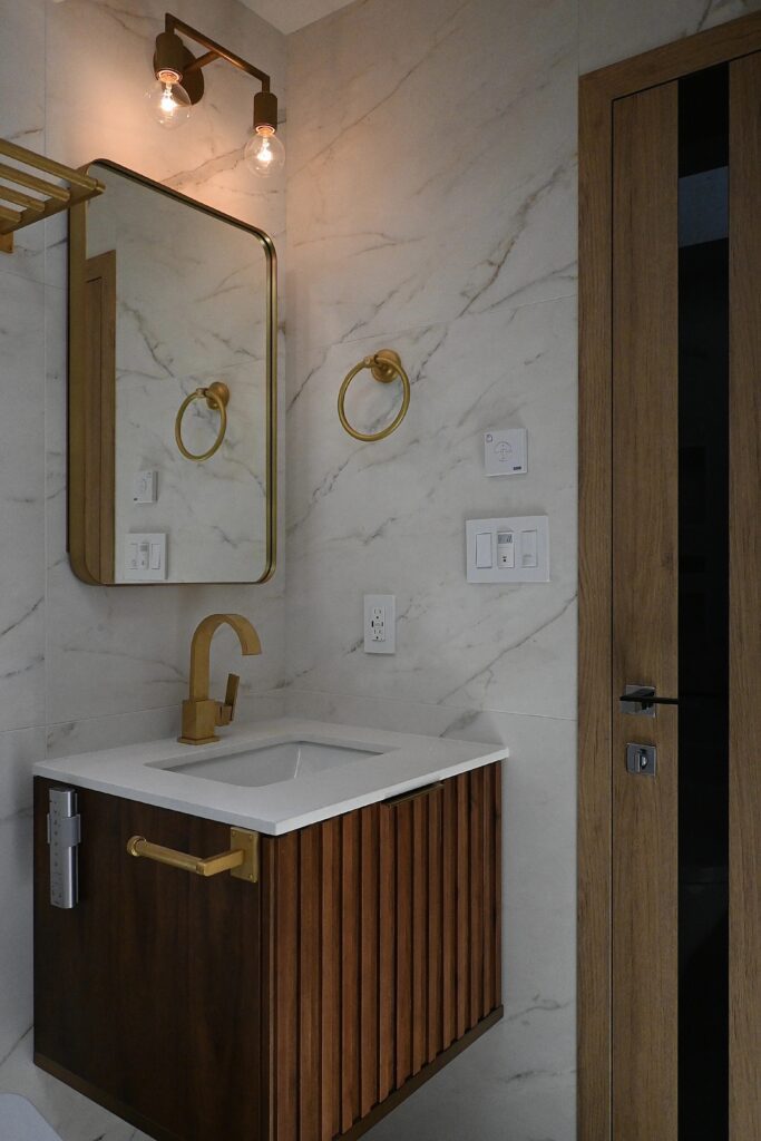 Single floating vanity in custom bathroom remodel