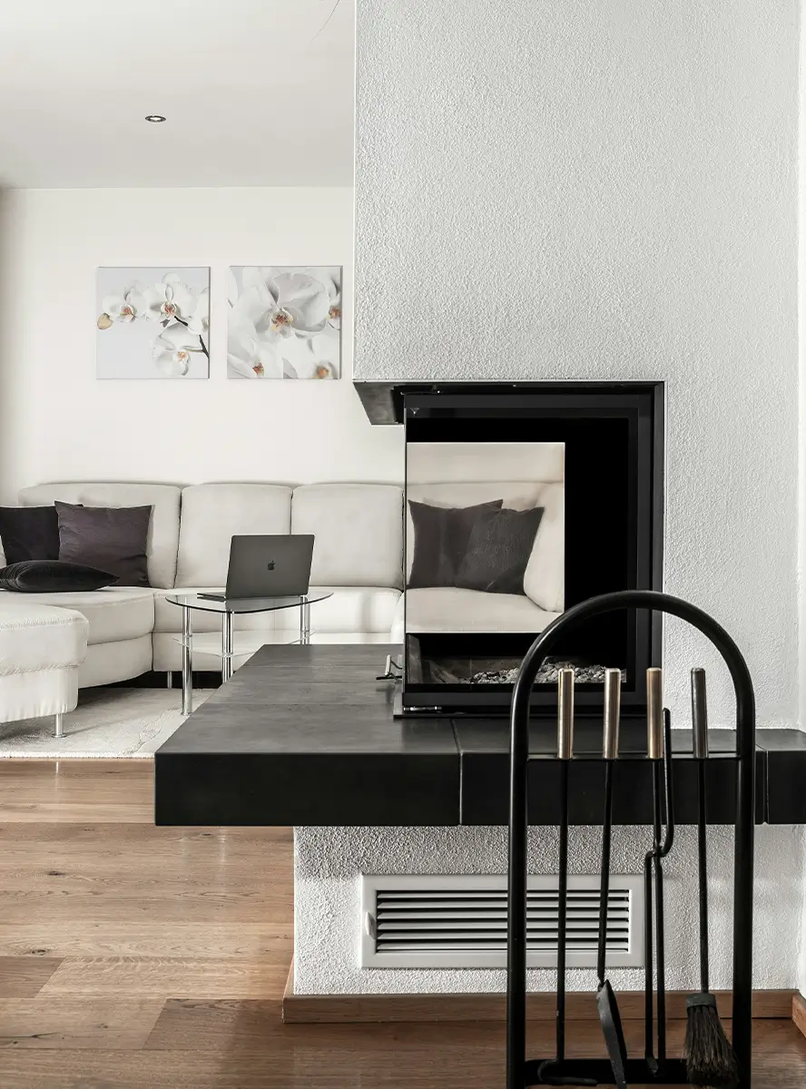 Remodeled living room with a built-in fireplace