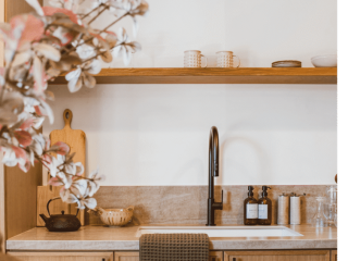 kitchen-sink-cabinet Kitchen with a sink & wooden cabinet & hand towel hanging