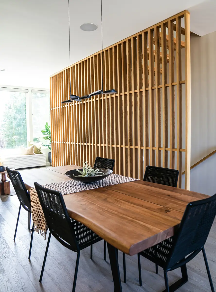 A dining area expansion with slatted wood panels