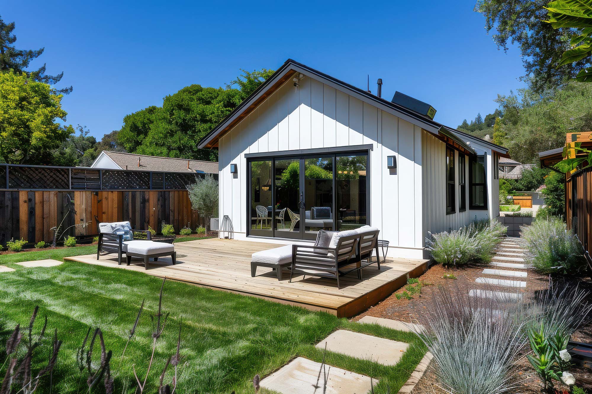 Los Altos custom ADU with lawn and chairs