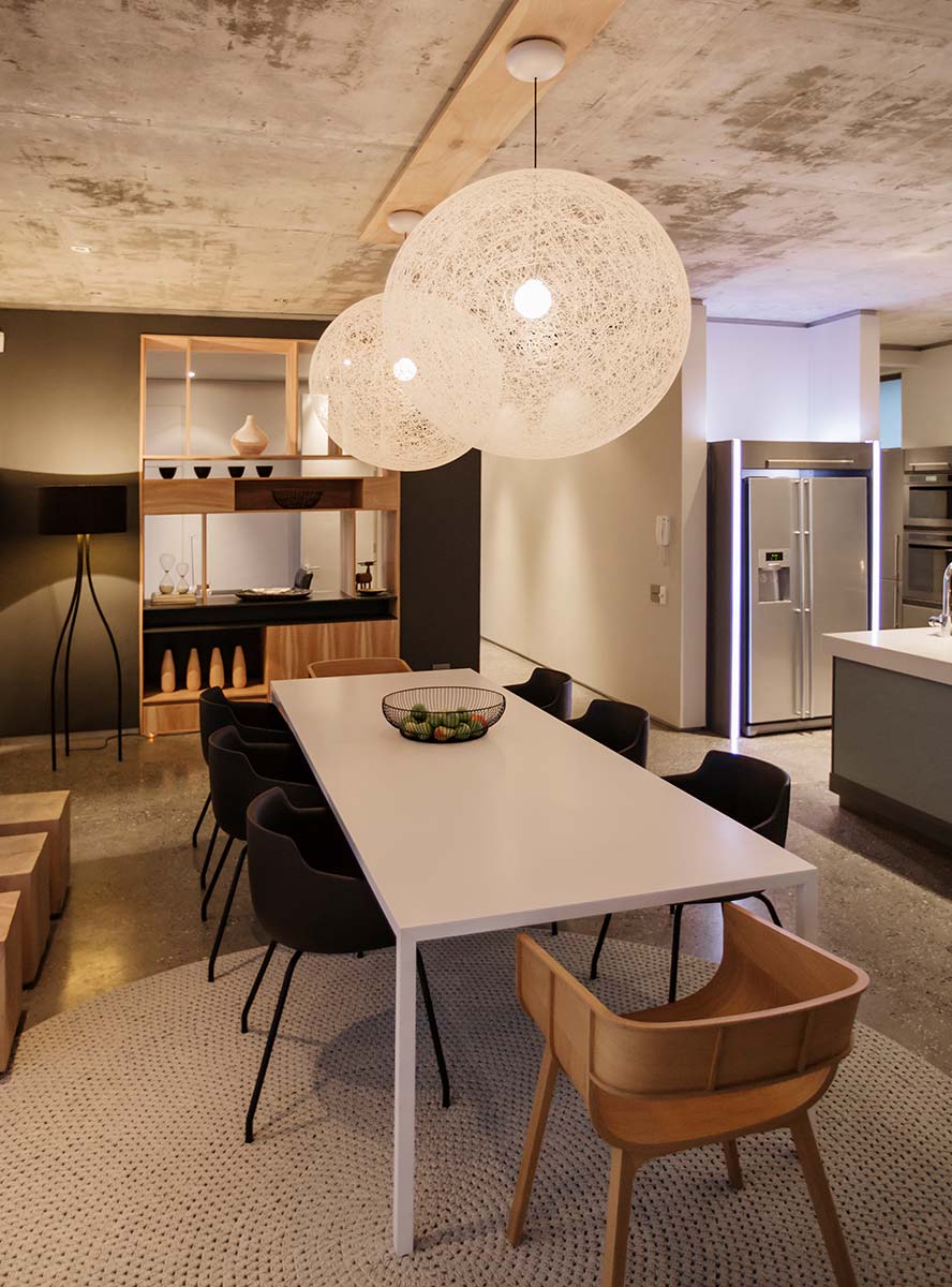 Modern dining room with hanging lights