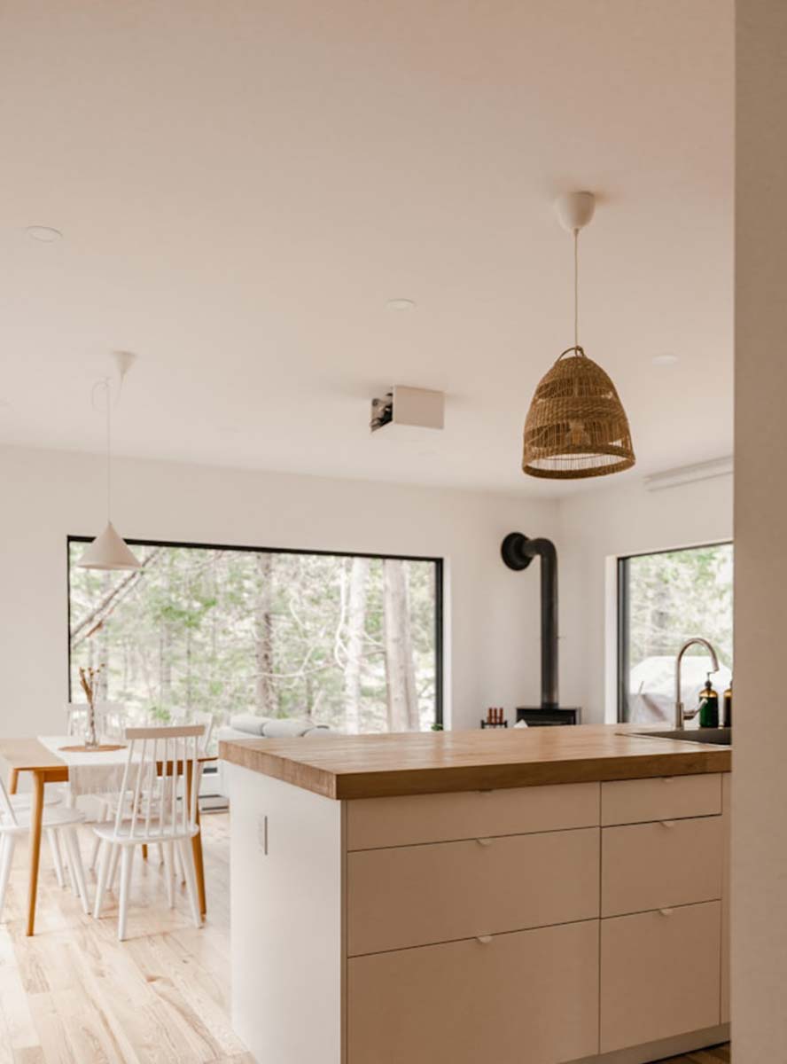 A new kitchen with wooden floors & white walls