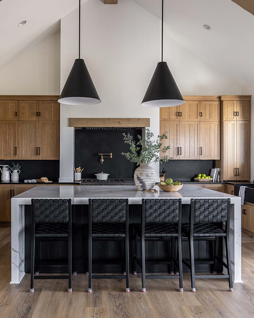 A modern kitchen with wood cabinets.
