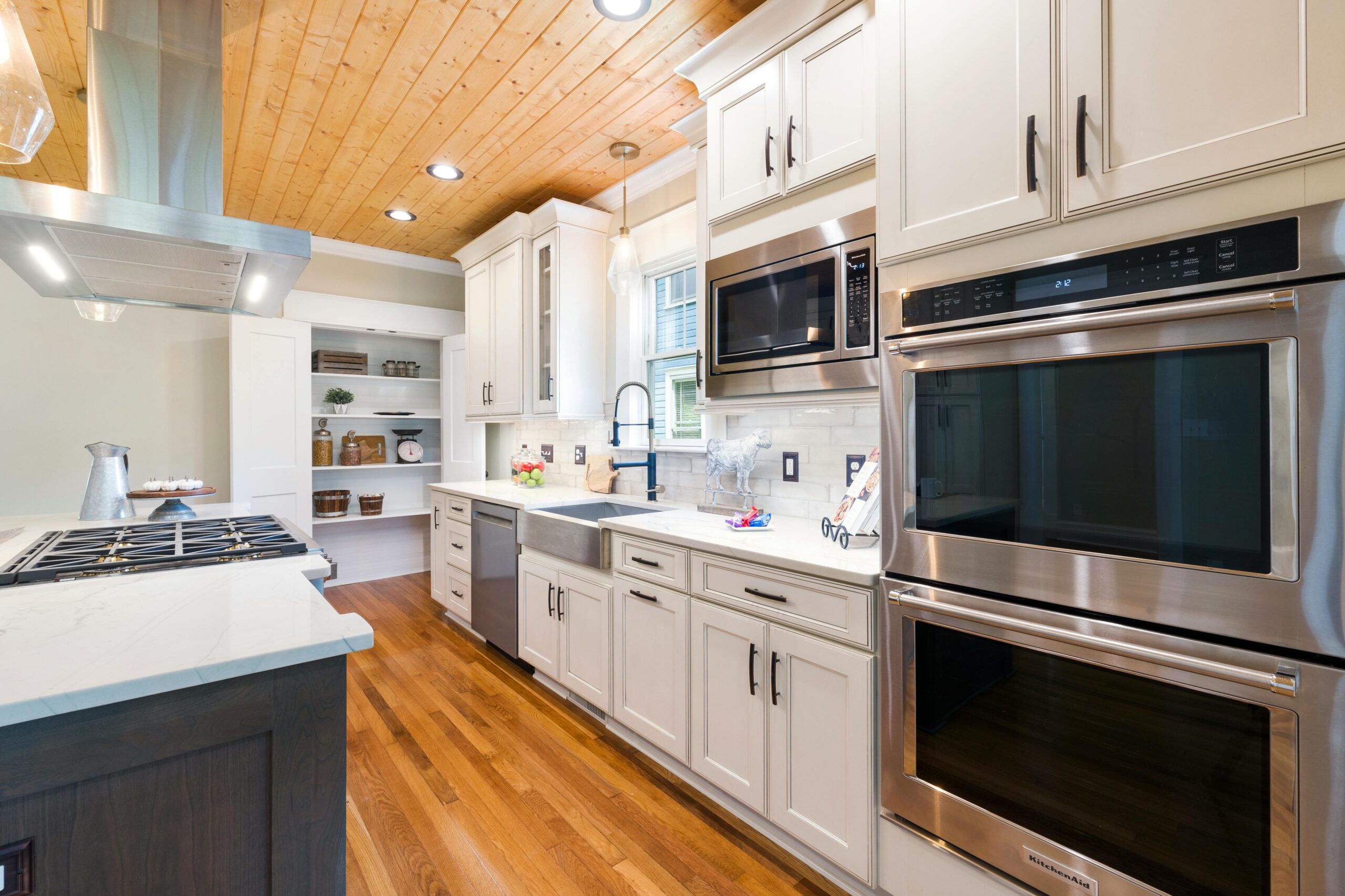 A modern wooden kitchen interior with the latest appliances