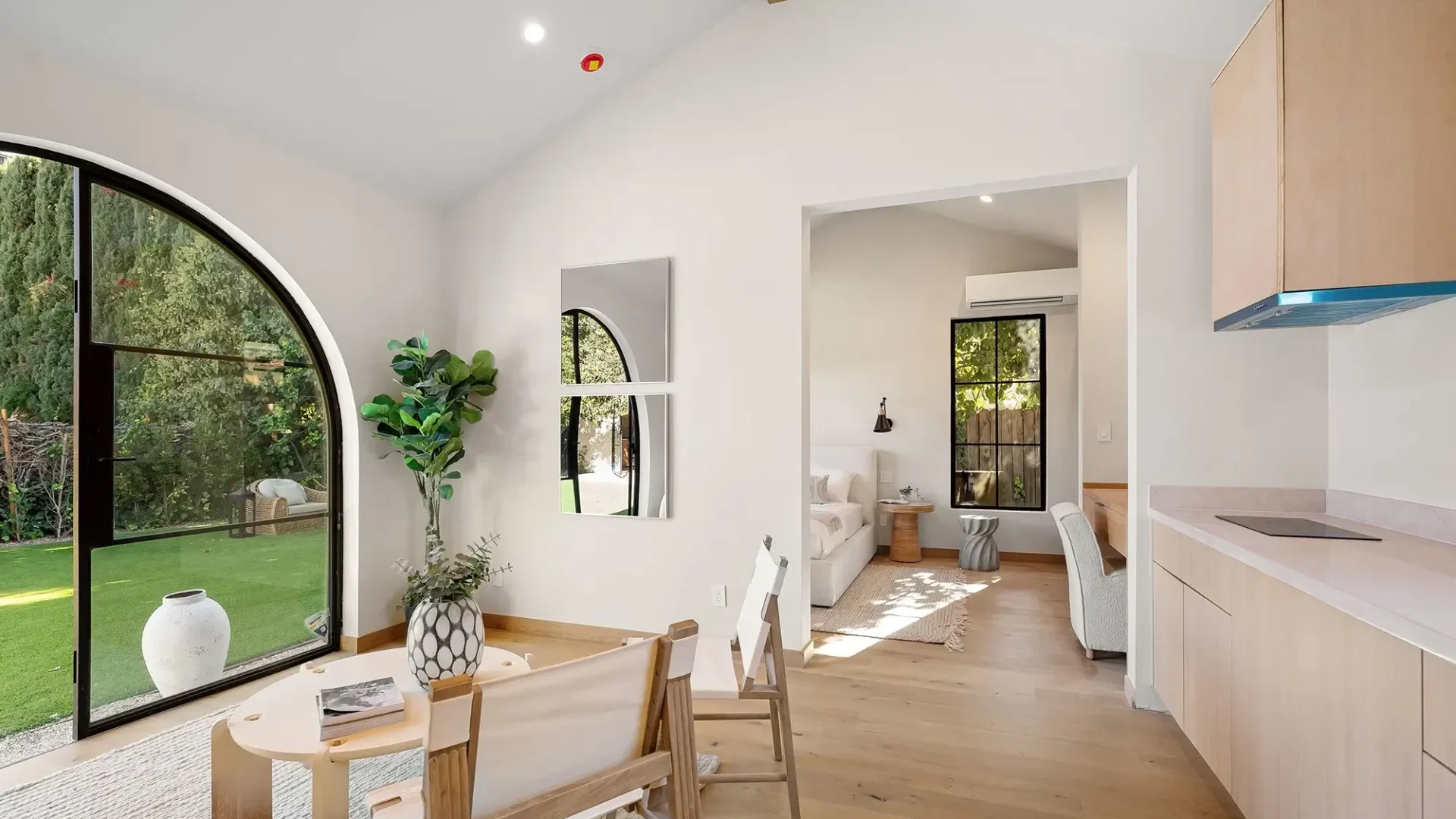 A home remodeling project with an arched glass door