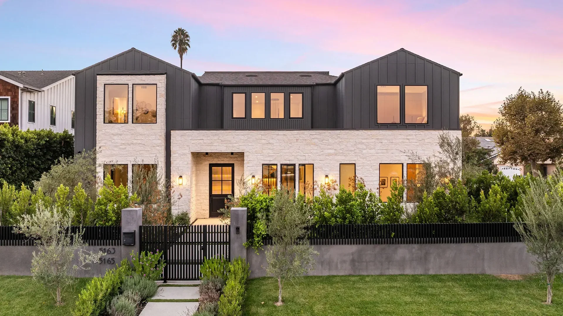 A newly constructed house with a big lawn