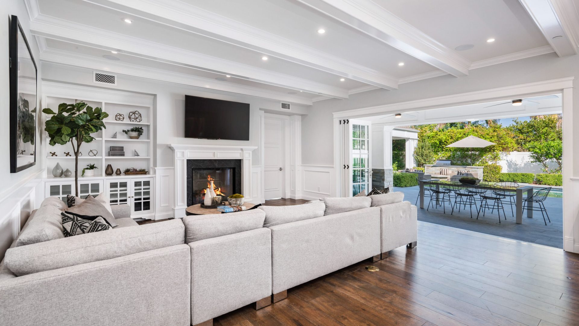 A living room with an open patio.