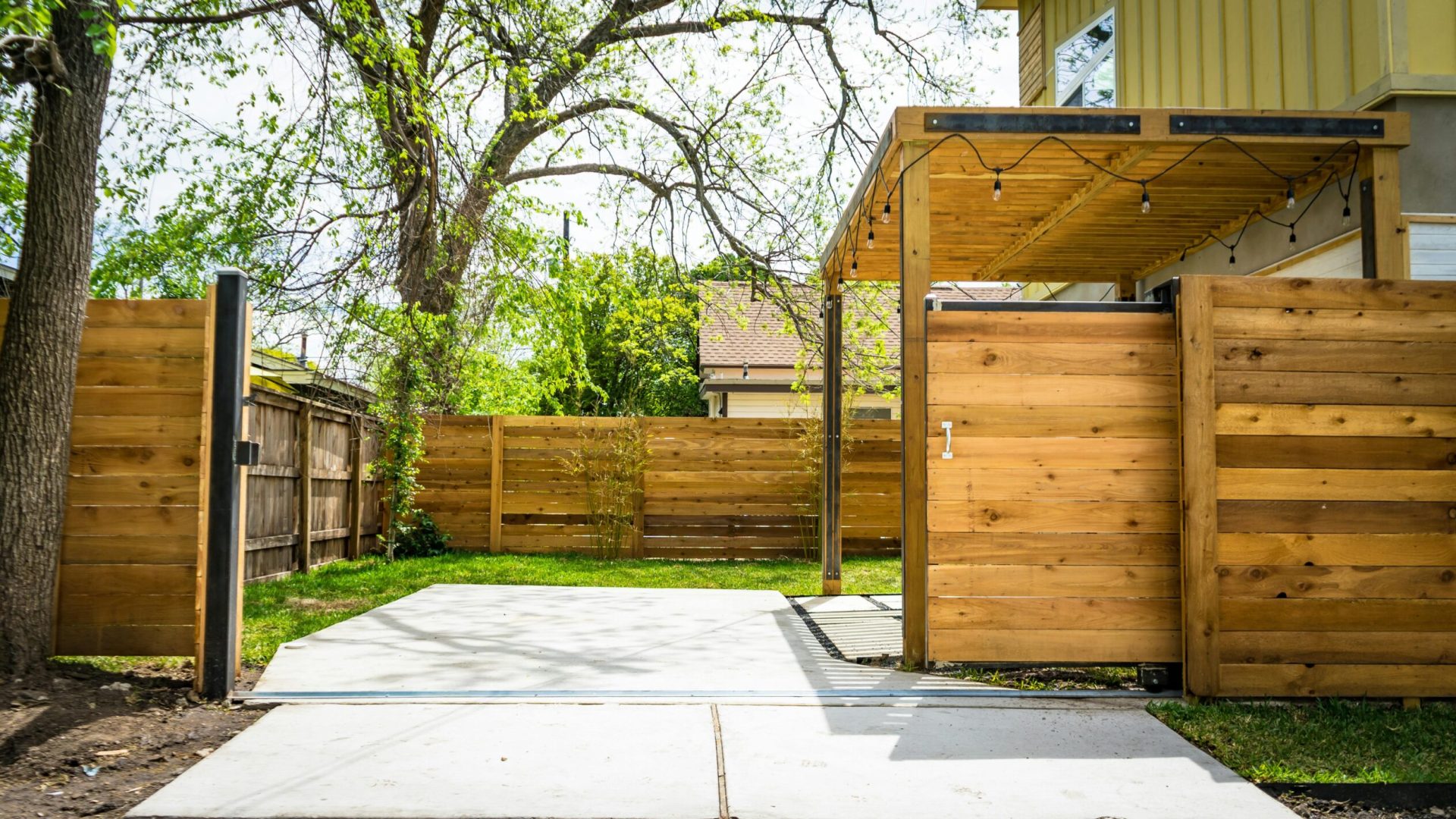 A brown wooden ADU with a separate entrance